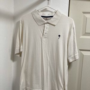 White polo shirt by a Bermuda Styles
